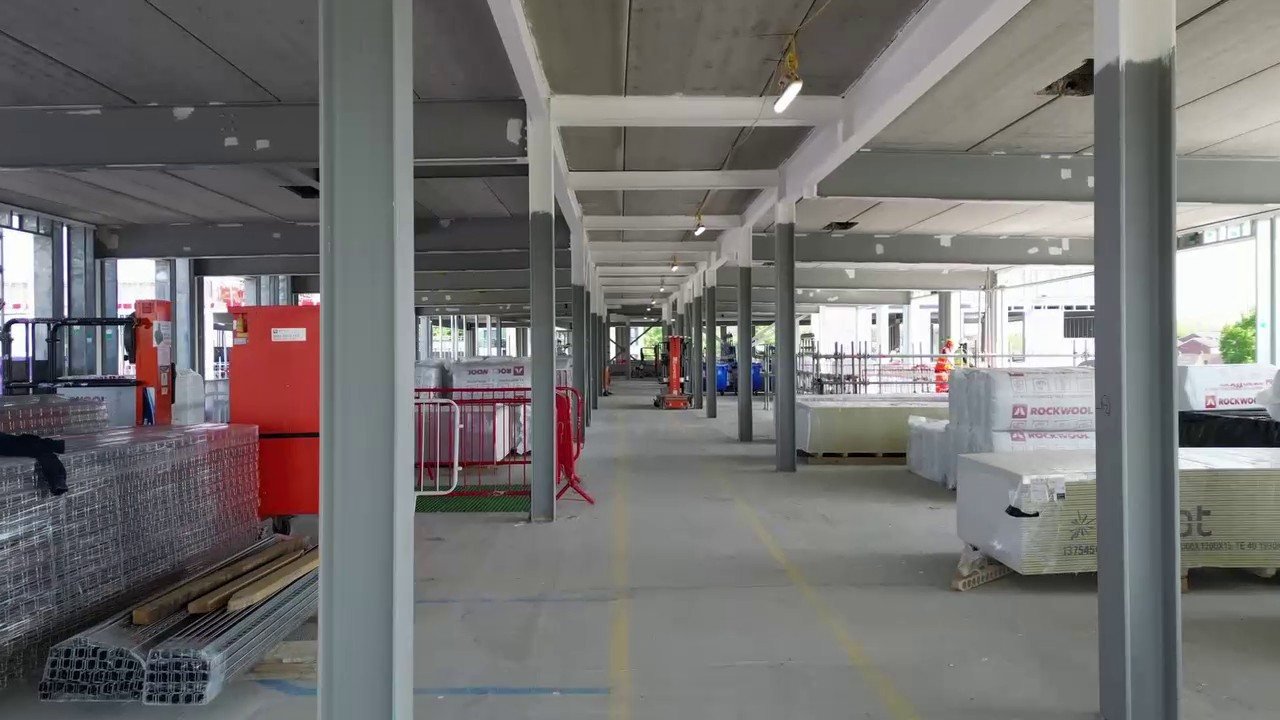 Islip Manor High School progress film thumbnail showing an interior under construction